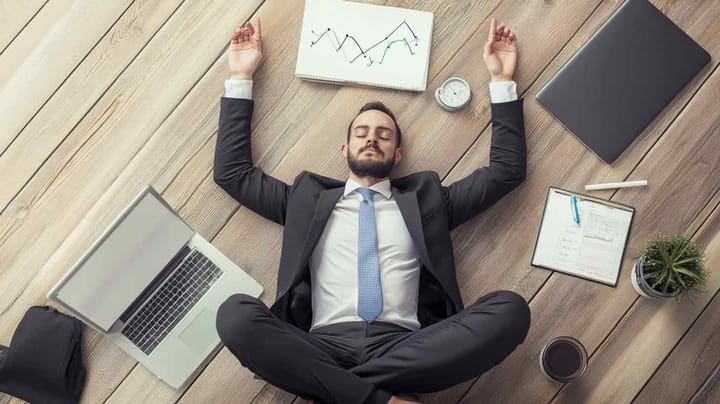 Image of an accountant lying backwards in a relaxed pose